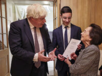 29/11/2021. London, United Kingdom.The Prime Minister, Boris Johnson meets Holocaust survivor, Lily Ebert while hosting a Hannukah reception with the Chief Rabbi, Ephraim Mirvis & Israeli Foreign Minister  Yair Lapid . 10 Downing Street. Picture by Tim Hammond / No 10 Downing Street